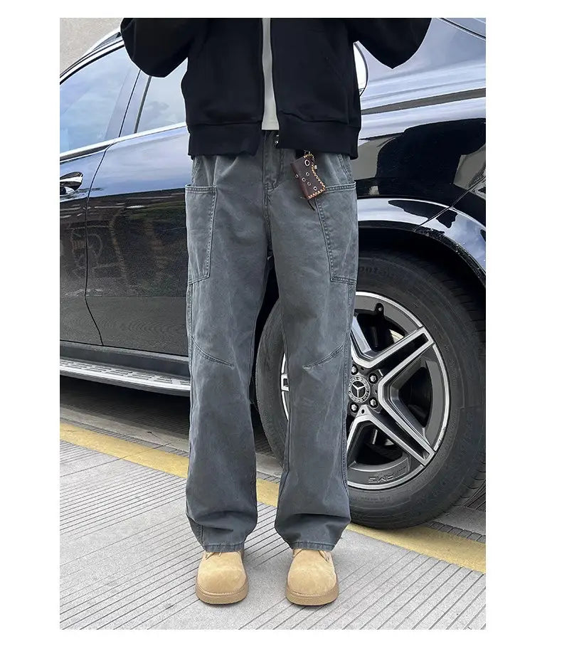 dark gray slightly faded denim cargo pants with reinforced stitching and multiple pockets designed for mens cotton workwear in olive green style.