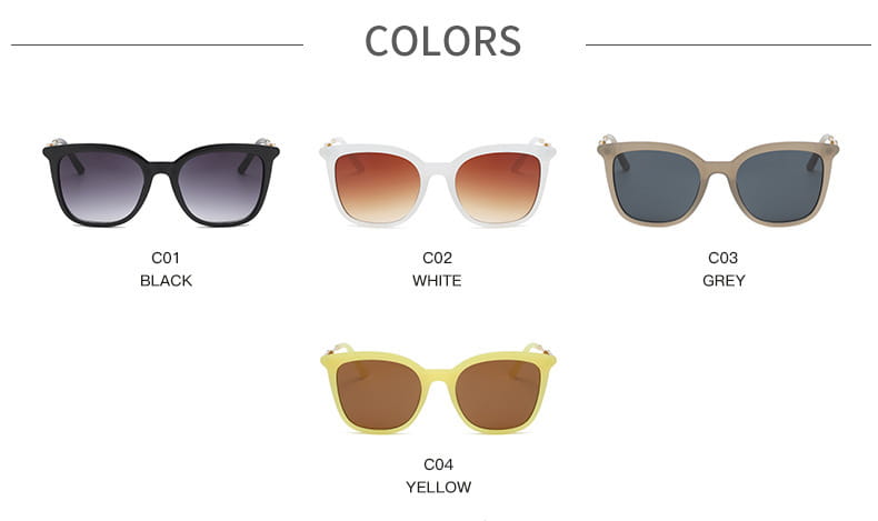 Vintage cat eye sunglasses featuring black white grey and yellow frames with gradient tinted lenses and gold chain detail.