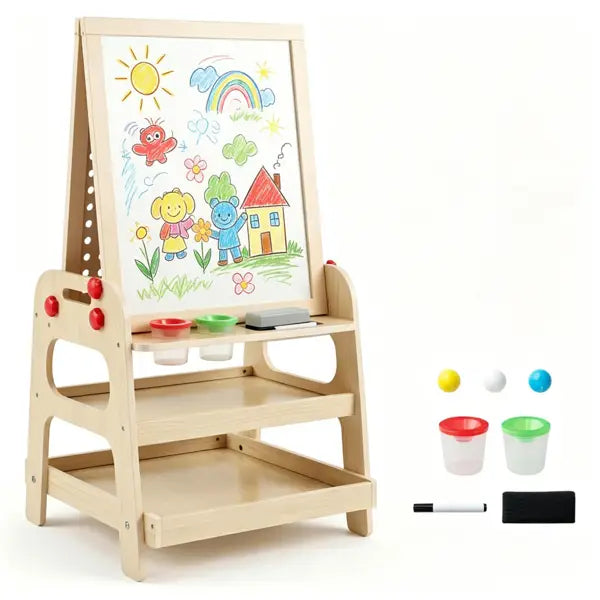 Light wood wooden art easel with white magnetic drawing surface displaying colorful crayon drawings of sun and rainbow featuring marble run and storage shelves.