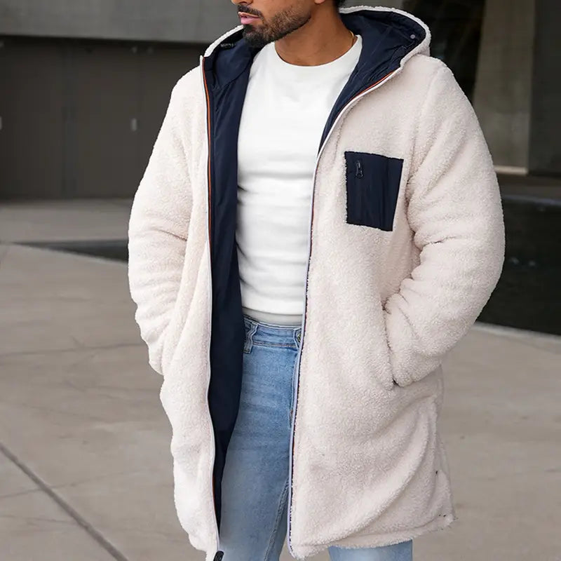 Men reversible shearling winter hooded coat in cream color with fleece lining, navy blue inner lining, and matching chest pocket.