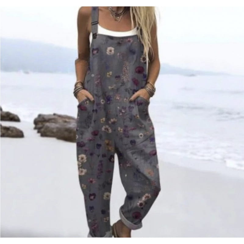 gray floral patterned denim printed suspender overalls with rolled up cuffs and adjustable straps designed as casual pants.