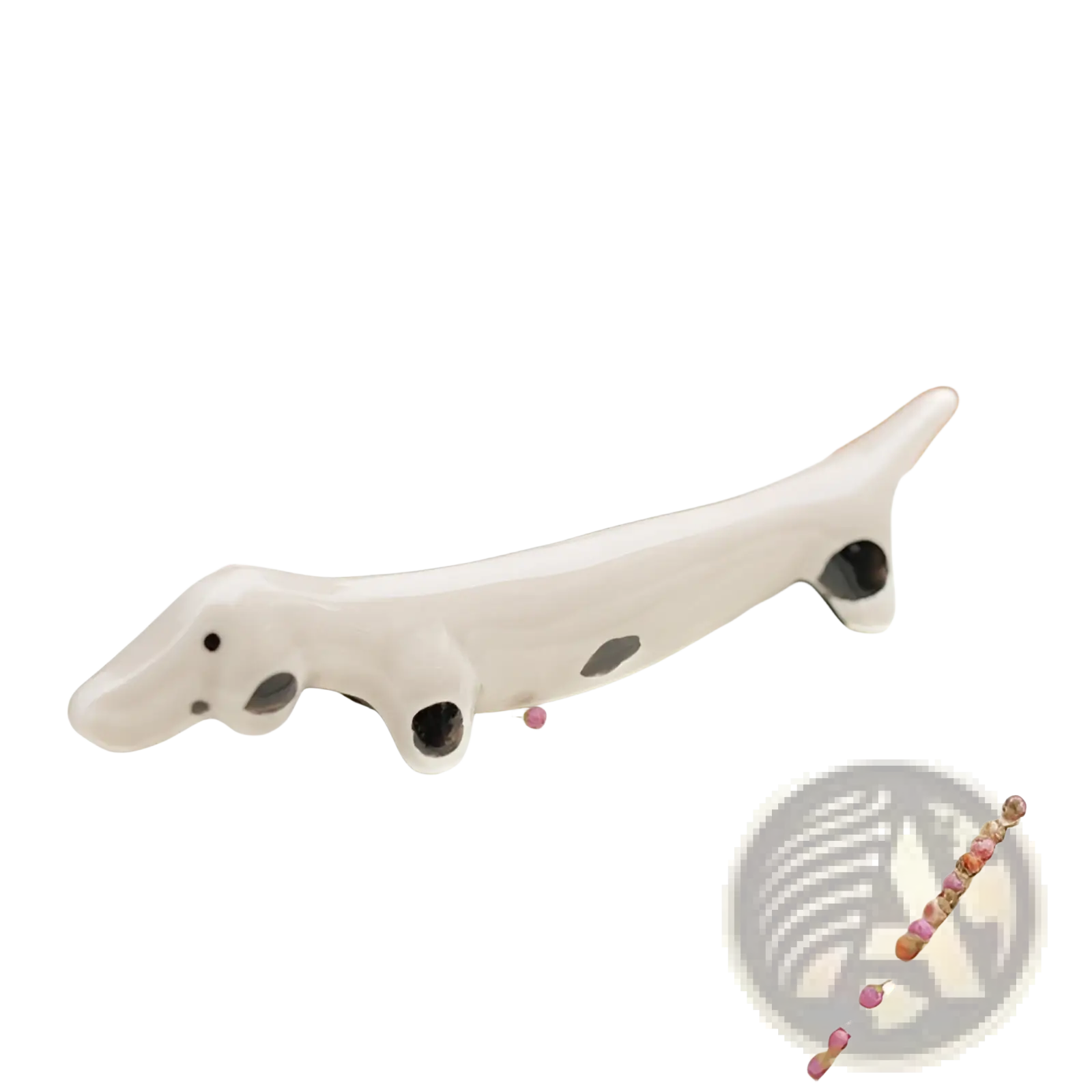 A delicate white ceramic dachshund chopstick rest with black spots and a glossy finish set of 4 pieces