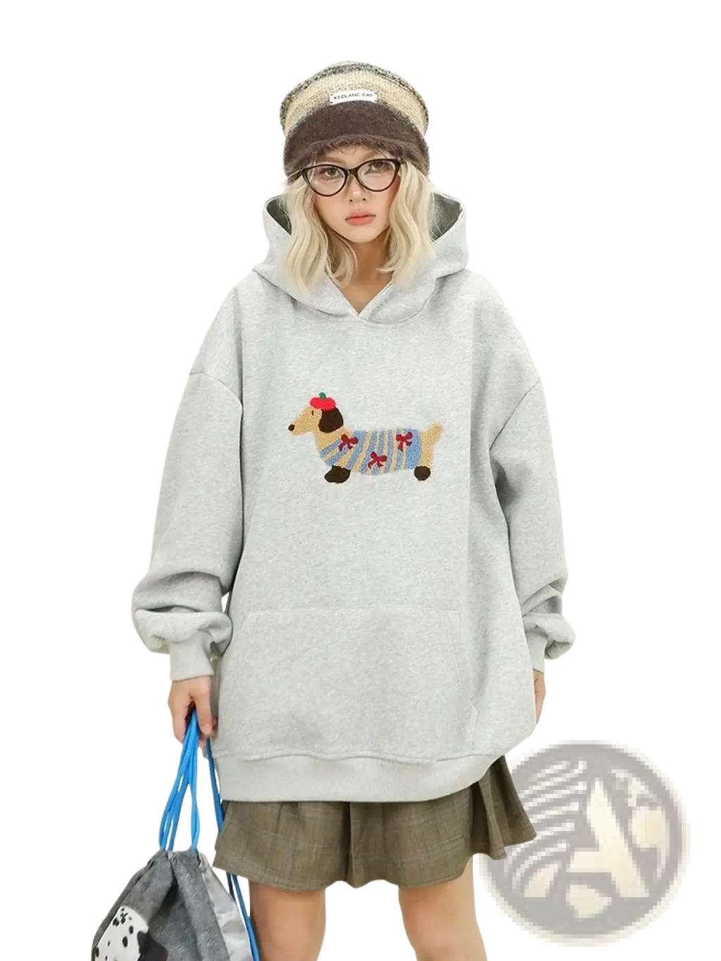 Light gray oversized hoodie with colorful embroidered dachshund in festive attire on the front