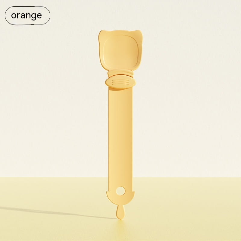 Cuillère de forme de chat en plastique orange, avec long manche et bords arrondis, provenant de l’ensemble « Cat Treat Squeezer and silicone pet food spoon set ».