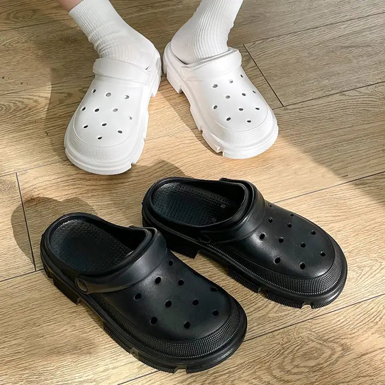 pink rubber unisex lightweight eva garden clogs and beach slippers with thick textured sole and circular perforations