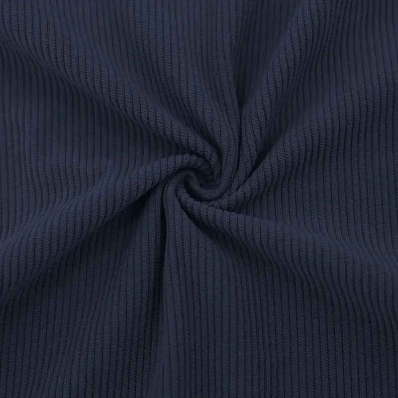 Slim fit corduroy patchwork pullover with contrast accents in dark blue featuring a distinct ribbed texture.
