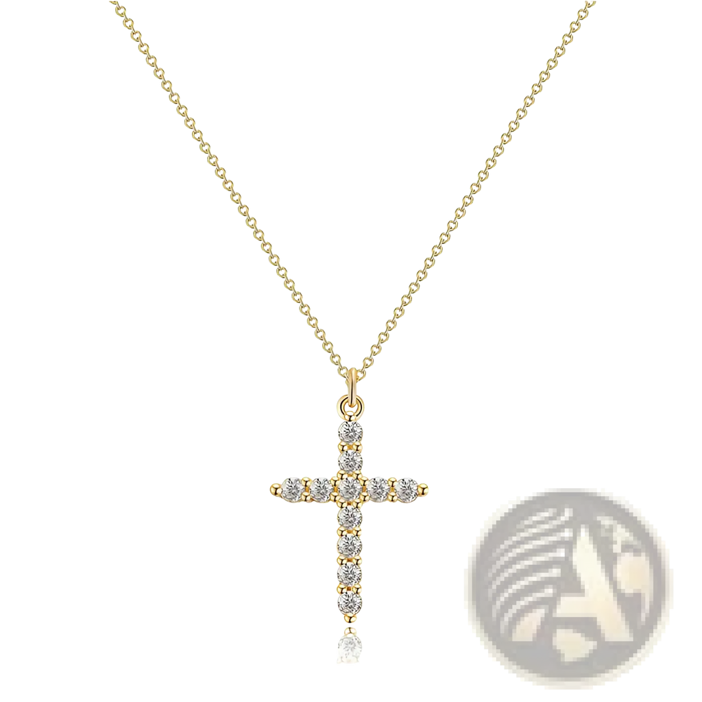 A dainty 14k gold plated sideways cross necklace adorned with sparkling clear cubic zirconia stones