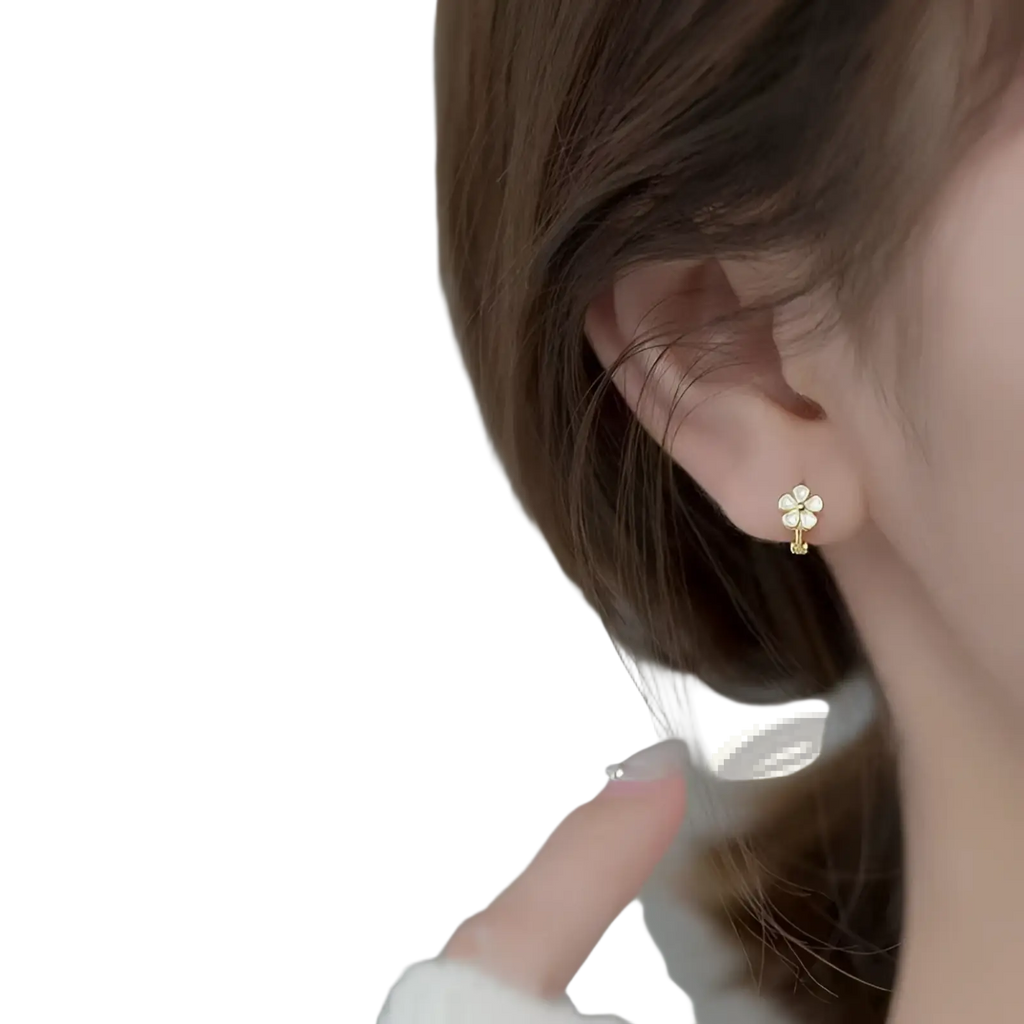 Gold four-leaf clover stud earring with clear crystal accents from daisy enamel flower clip on and stud earrings collection