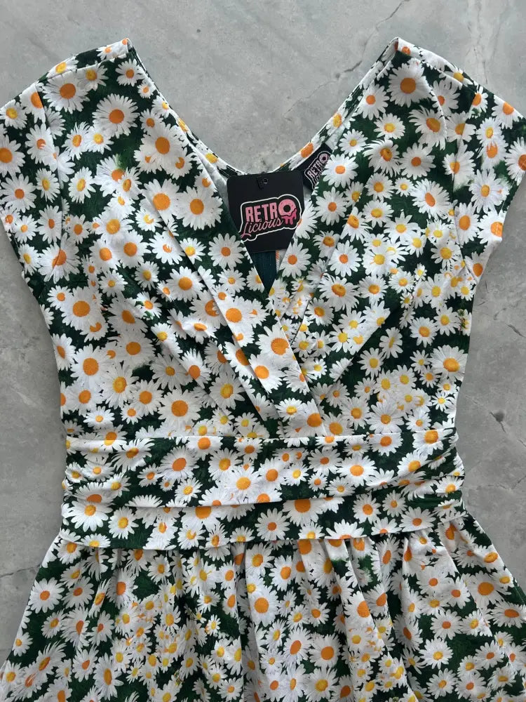 Vintage-style retro licious greta dress with white daisies on deep green cotton fabric in 1950s design