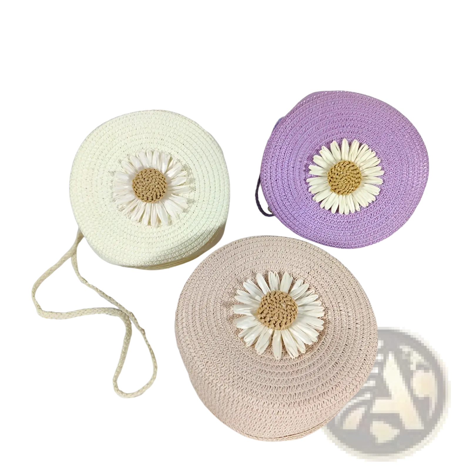 Three round woven straw crossbody bags each with a central embroidered white daisy and beige center shoulder purse