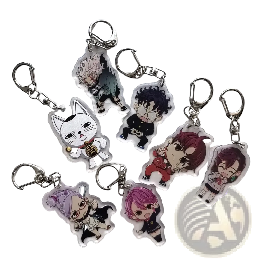 Clear acrylic dandadan anime keychain featuring colorful momo chibi character with silver metal clasp pendant
