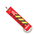 Red embroidered danger warning embroidery keychain with black and yellow hazard stripes and do not pull danger handle text