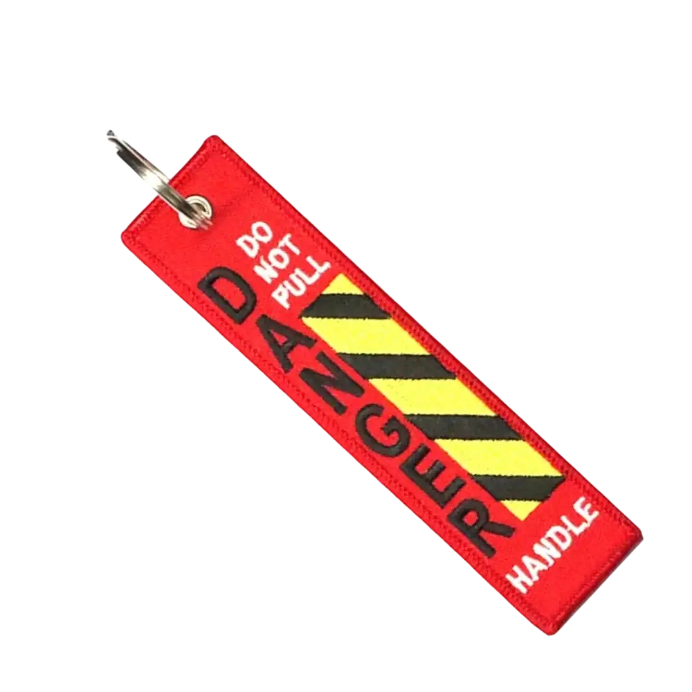 Red embroidered danger warning embroidery keychain with black and yellow hazard stripes and do not pull danger handle text