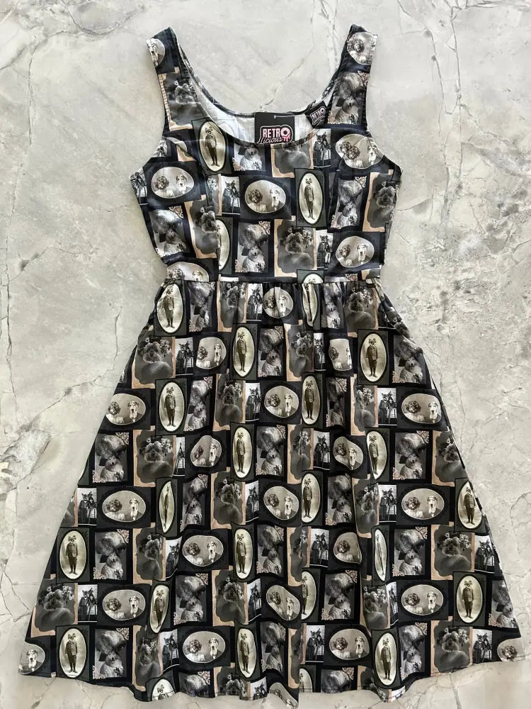 Black sleeveless cotton dapper dogs vintage fit and flare dress with pockets and sepia grayscale oval photo pattern