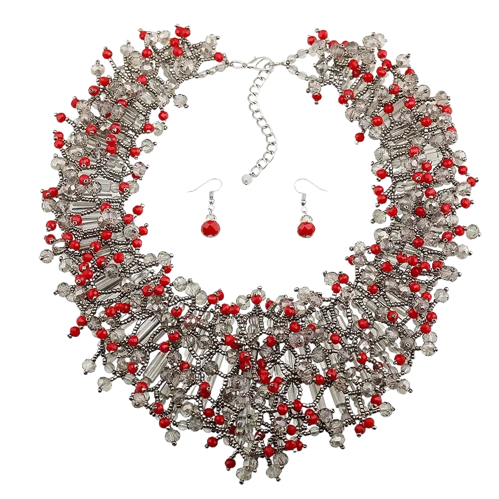 Dark blue crystal statement necklace set featuring red and clear crystal beads with silver-toned metal accents