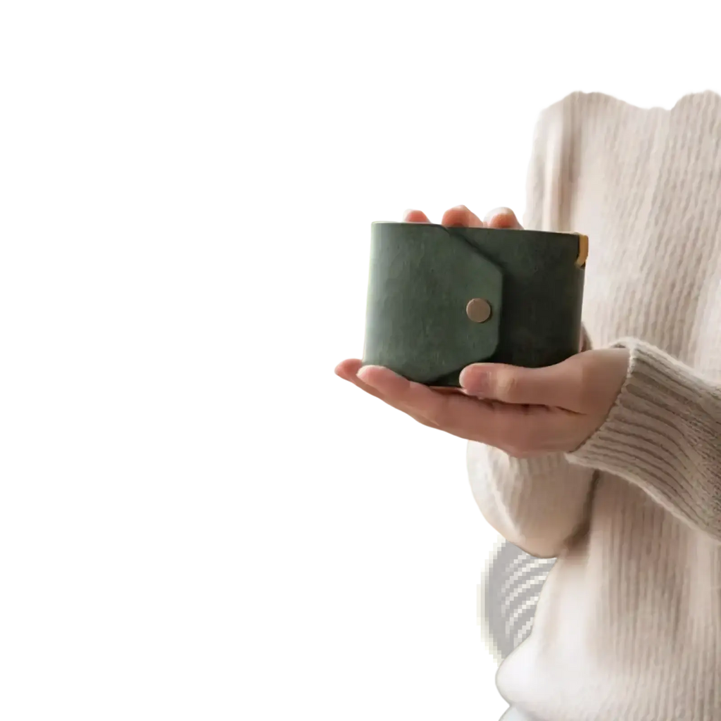 Dark green leather smart wallet with gold-tone button closure designed for quick access pocket use