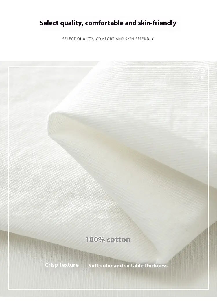 Chemise à manches longues en coton style japonais pour homme, fabriquée dans un tissu blanc 100 % coton, avec une texture nette et une couleur douce.