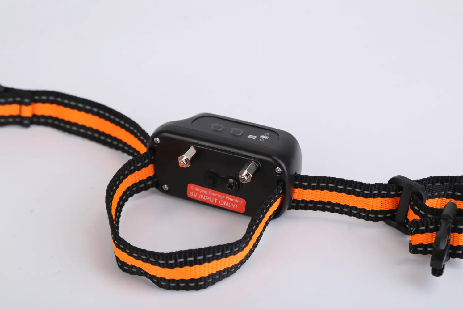 black and orange striped dog training collar with a waterproof electronic control unit featuring two silver connectors for voice record use