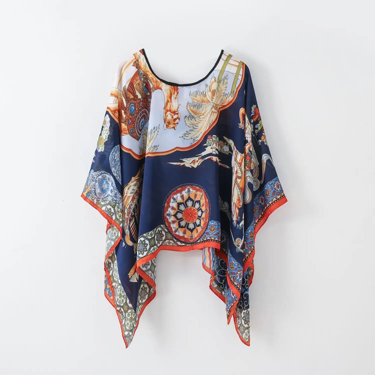 A navy blue silk patterned pullover shawl cape outerwear featuring a vibrant intricate design with ornate floral and mythical creature motifs in orange gold red and white shown from the back side.