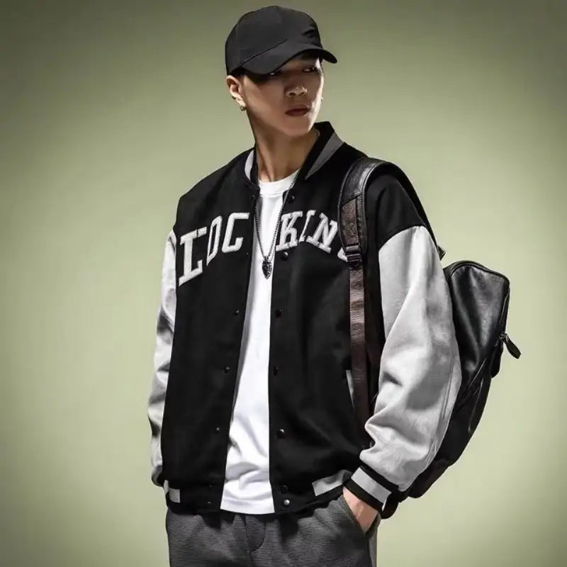 black and gray varsity jacket Korean style loose casual top featuring loc kin lettering across the chest