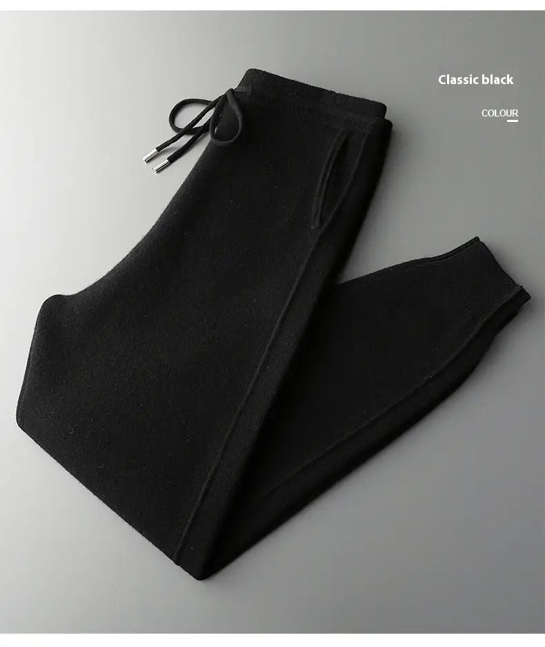 men’s black wool harem joggers with a drawstring waist and ribbed cuffs designed for high waist casual wear