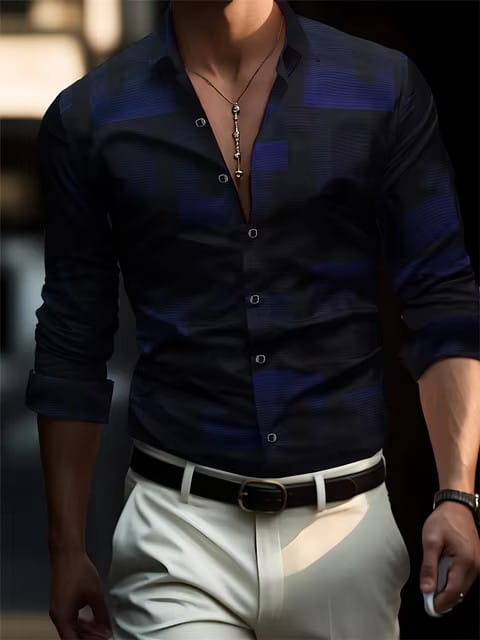 Men’s premium geometric and printed long sleeve button down shirt in dark blue and navy plaid with rolled-up sleeves.