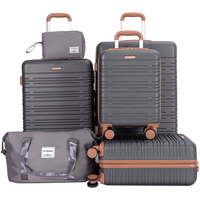 Dark gray hard-shell spinner suitcases with tan accents and retractable handles from the 6 piece abs hard shell luggage set with TSA lock.