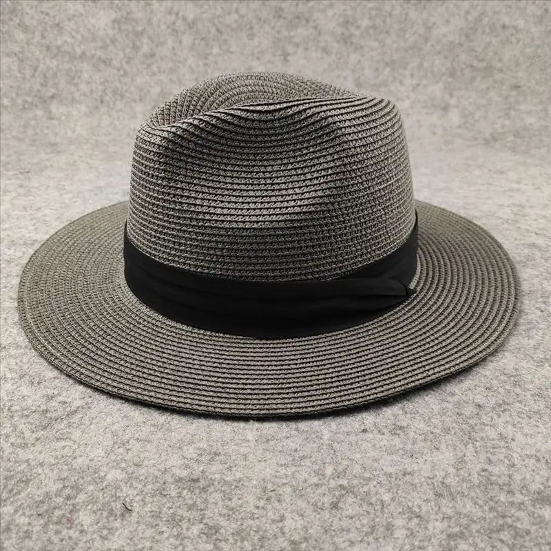 gray woven straw fedora hat with black satin ribbon band designed for foldable sun protection for men