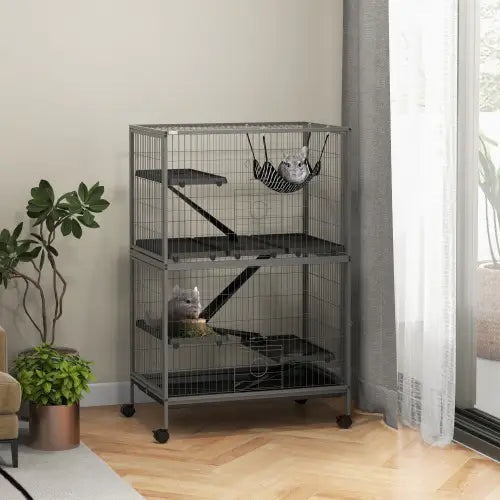Jaula para hurones pequeños de metal gris de 5 niveles con ruedas de goma negras y una hamaca colgante para gatos