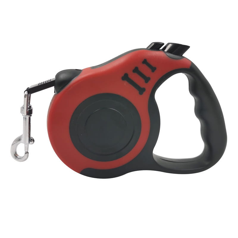 Retractable dog leash with ergonomic textured grip handle in red and black designed for comfortable walking.