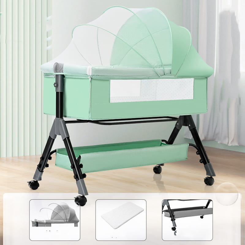 A mint green portable folding baby crib with a transparent mesh mosquito net, mattress, and black and gray metal legs with wheels for mobility.