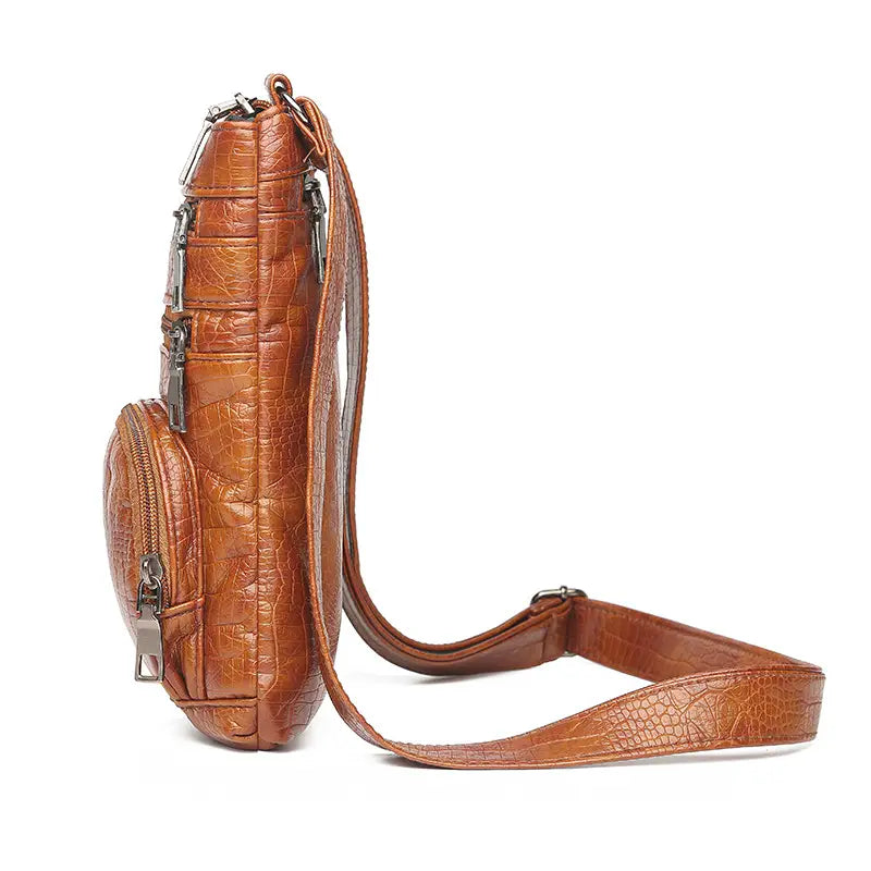 Brown retro crocodile textured soft faux leather crossbody bag with silver-toned zippers and hardware.