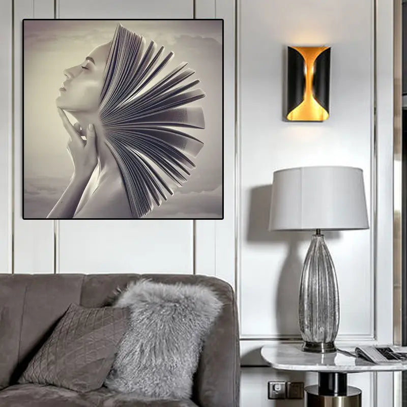 Impresión en lienzo blanco y negro de un arte mural enmarcado que representa a una mujer de perfil con las páginas de un libro abierto que se despliegan desde su cuello, titulado "Book Head Woman Profile".