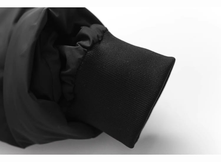 black ribbed knit cuff with slightly gathered elasticated finish on hooded puffer cotton coat