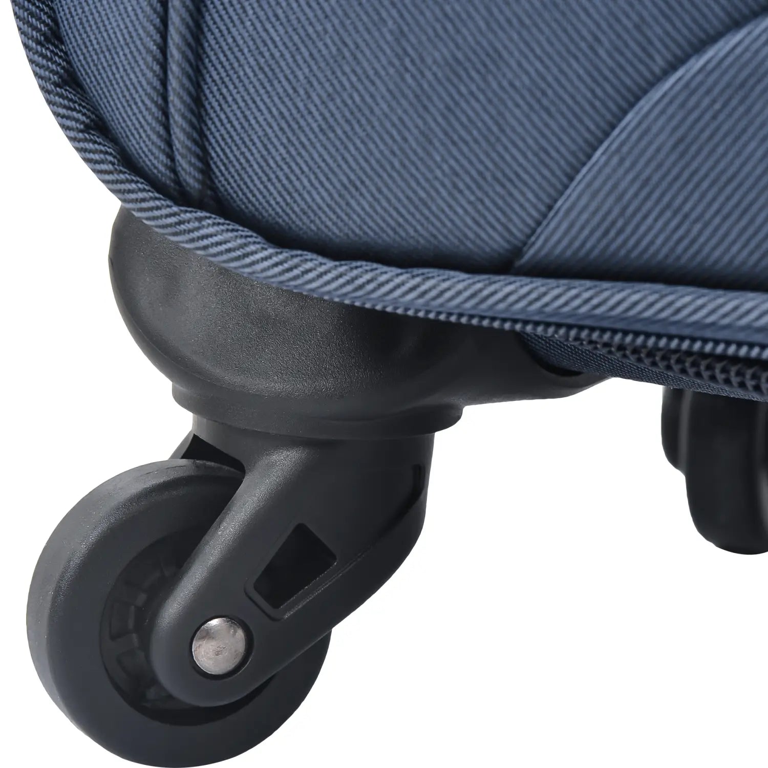 Navy blue softside expandable three piece spinner luggage set featuring a dark blue textured fabric suitcase with a black plastic spinner wheel and metal axle.