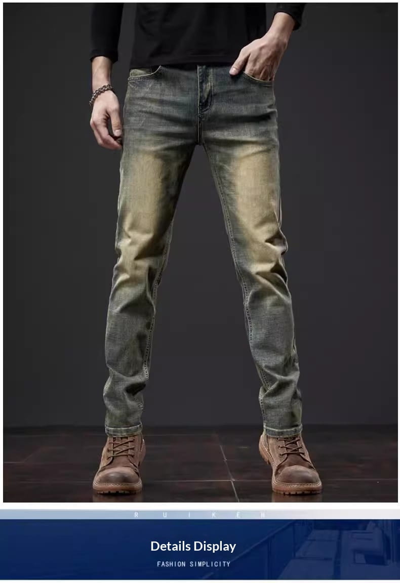 Men slim fit green denim jeans featuring distressed dark green denim with a faded yellowish wash.