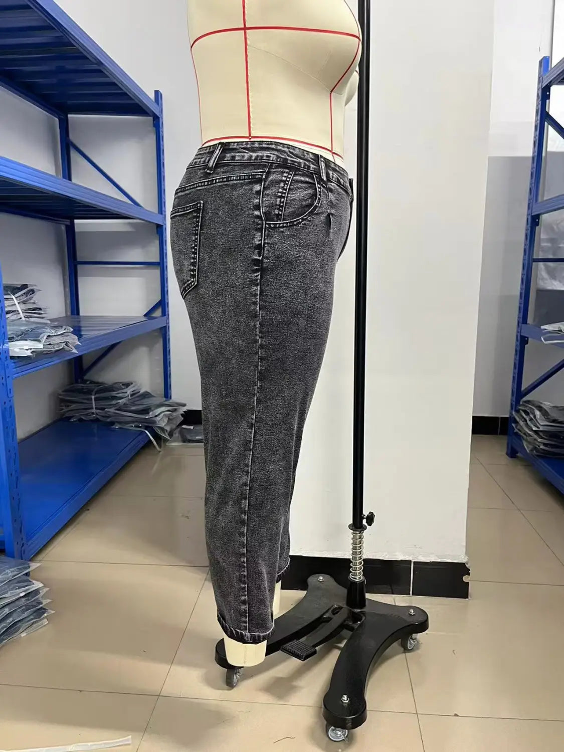 plus size retro washed tapered denim jeans in dark gray with a slightly faded wash and classic five-pocket design displayed on a mannequin.