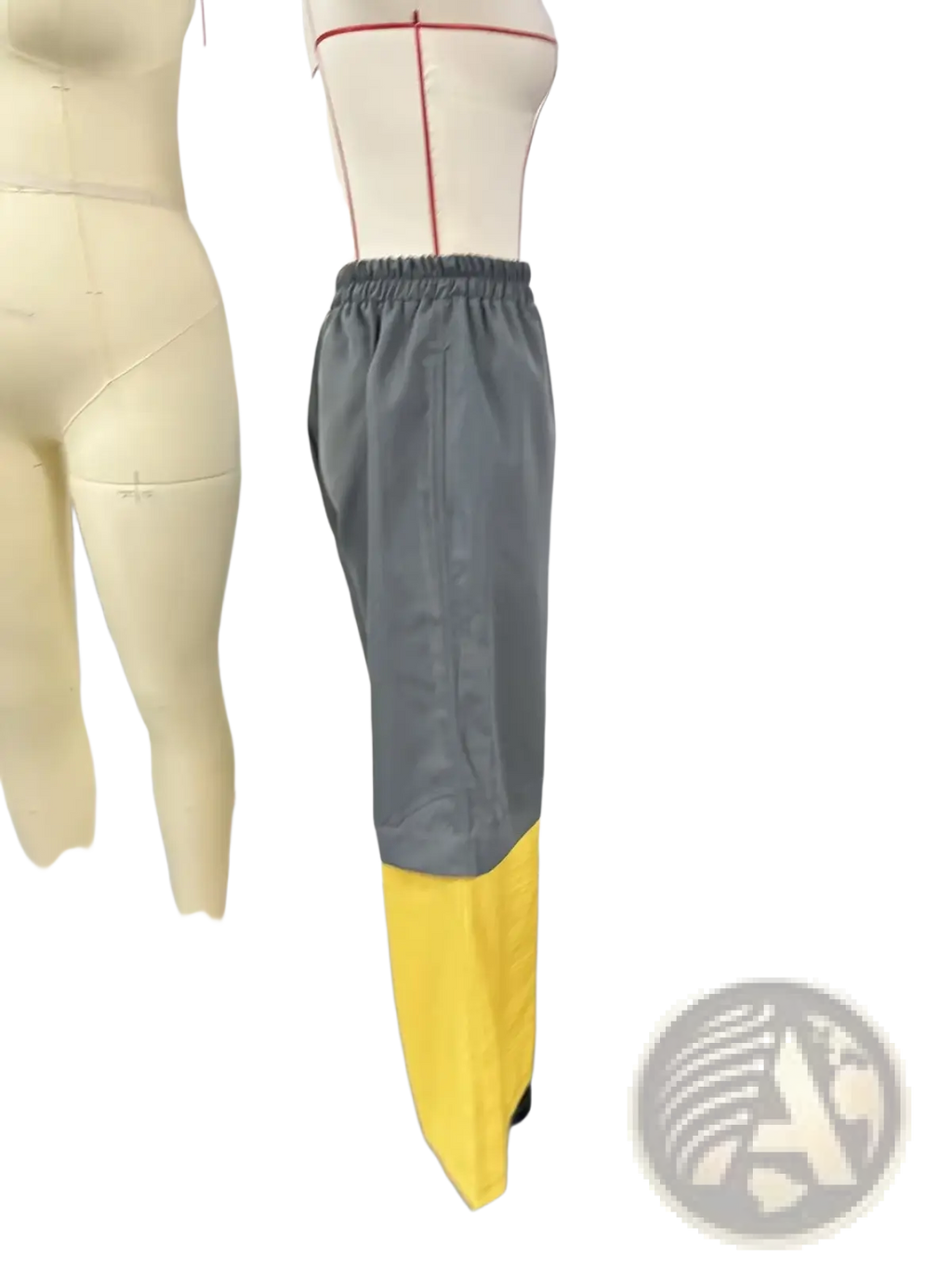 Gray and yellow two-tone deconstructed denim wide leg pants with elastic waistband for athletic wear