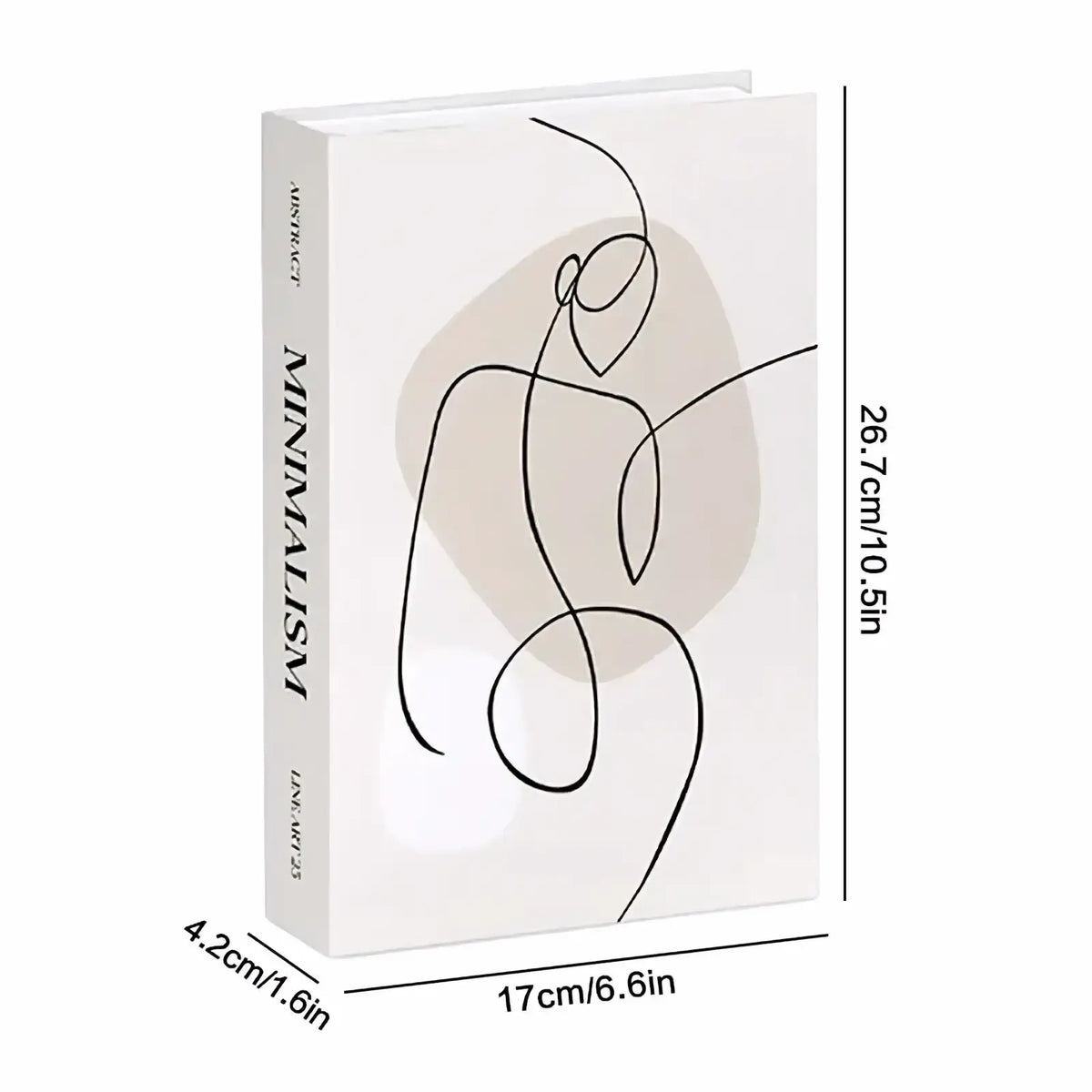 A minimalist abstract art decorative fake book with a cream cover, black line drawings, and a beige circular background for coffee table decor