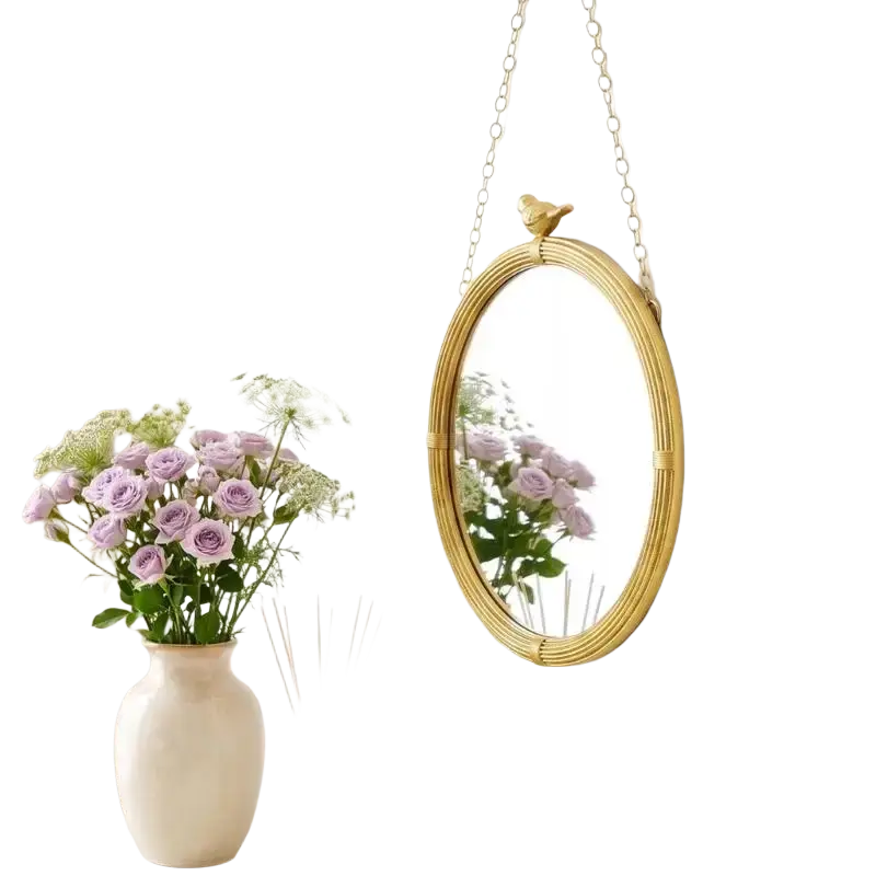 Gold-toned decorative mirrour with woven resin frame and bird figurine for interior wall hanging display