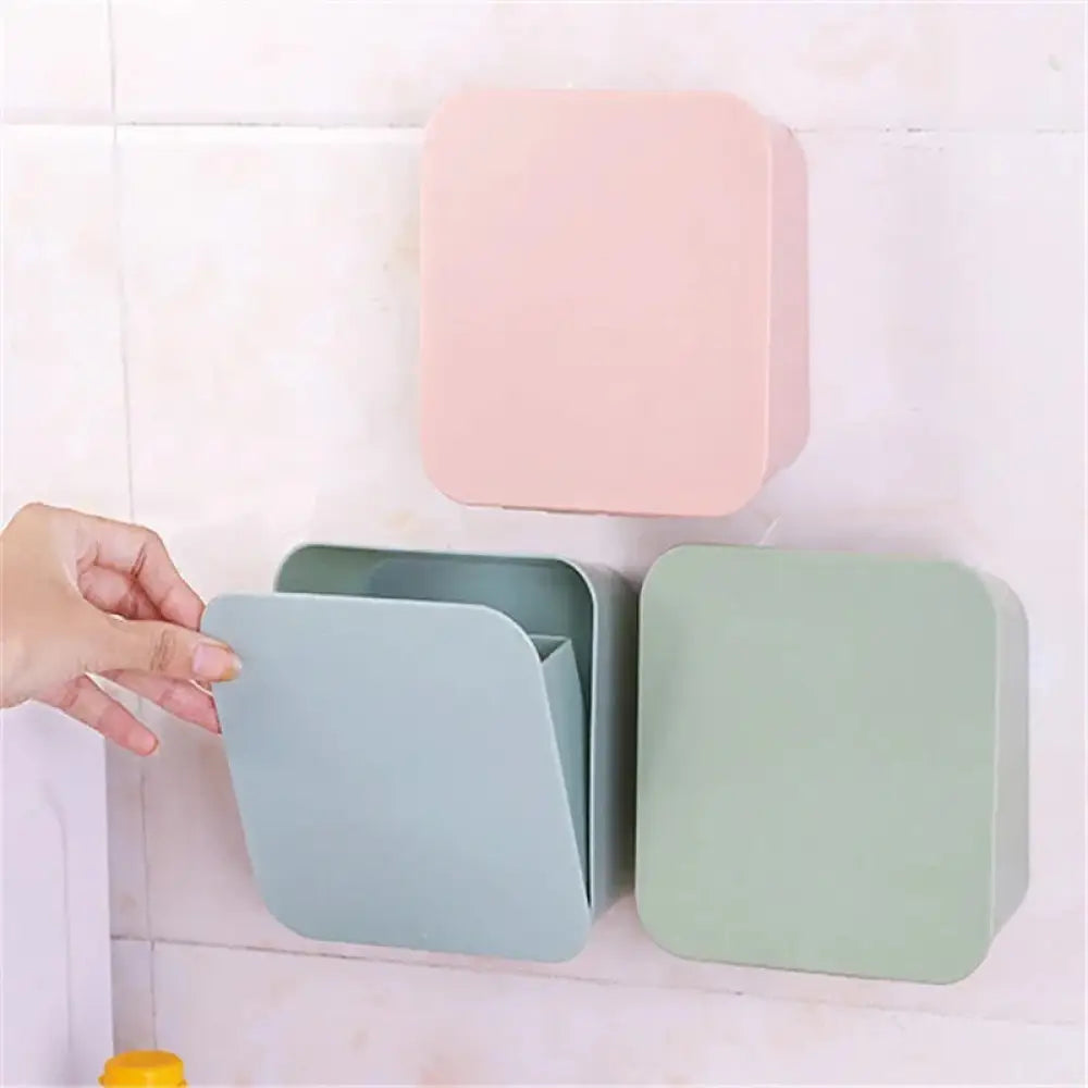 Pastel wall mounted vanity organizer featuring sleek plastic trash bins in soft pink mint green and light blue colors