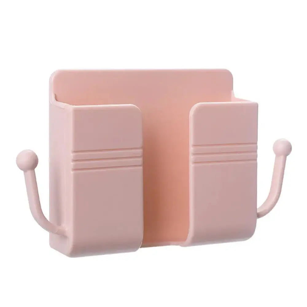 Pastel pink plastic wall mounted vanity organizer with two compartments and hooks for makeup storage