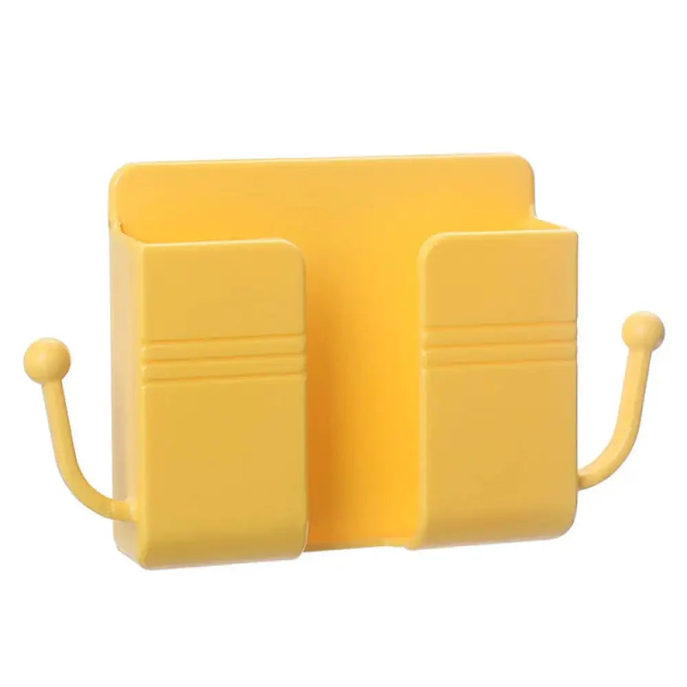 Yellow plastic pastel wall mounted vanity organizer with two compartments and curved hooks for makeup storage