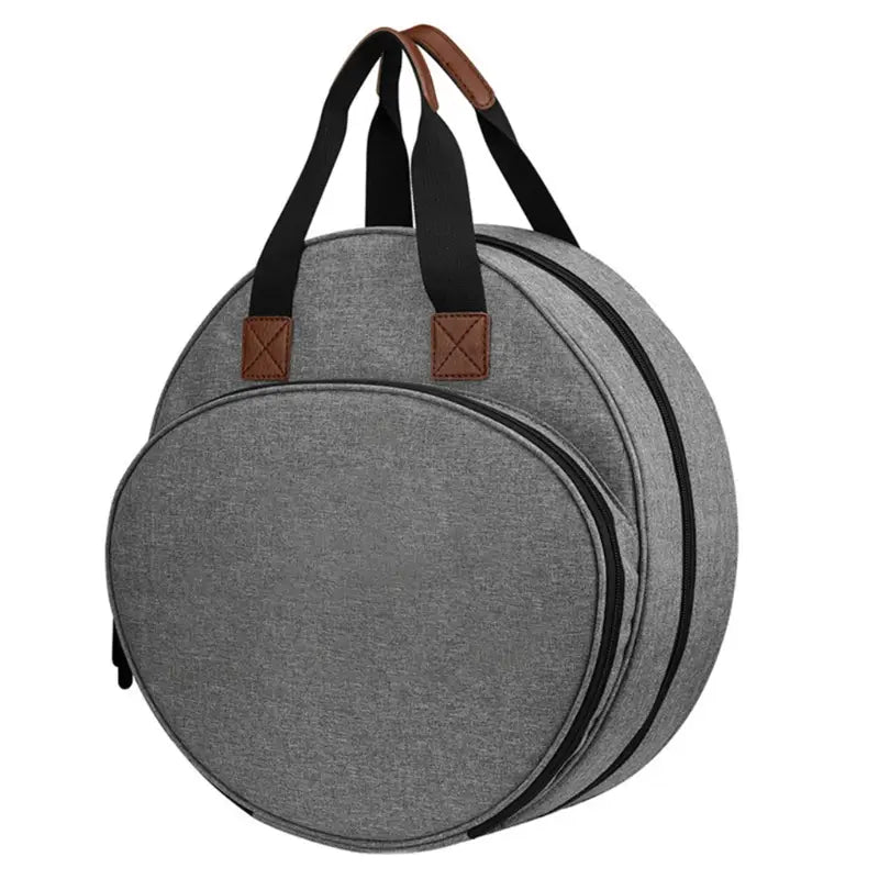 Premium circular embroidery and craft tool storage tote in gray with black zippers and brown leather handle accents.