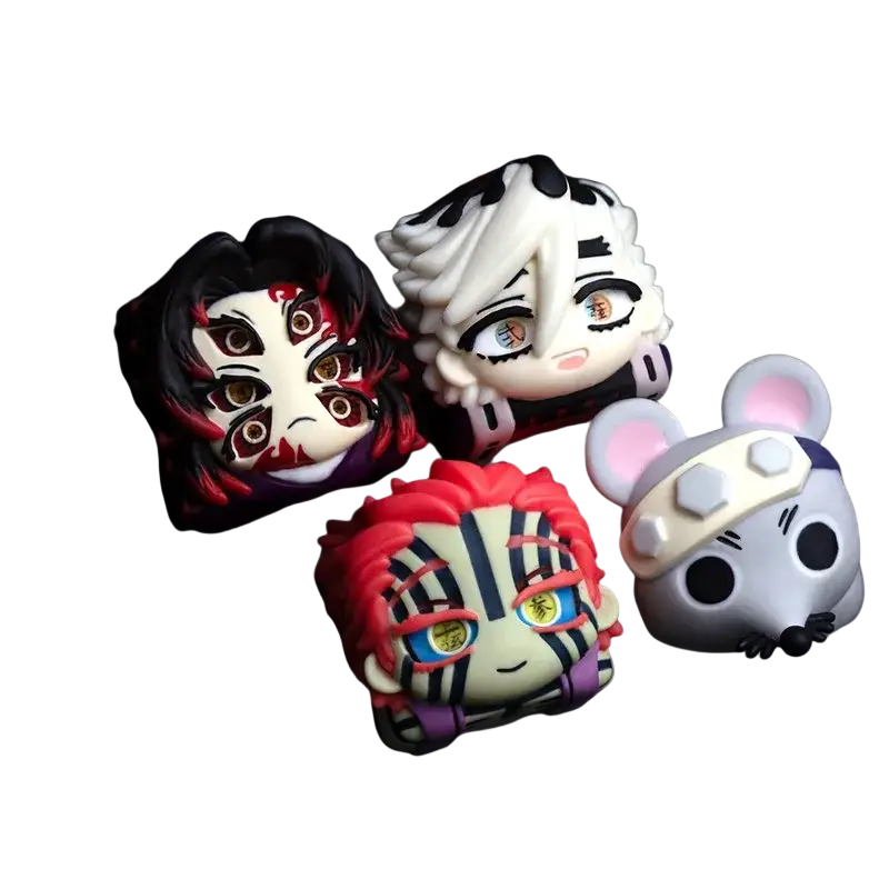 Chibi-style demon slayer resin keycaps finished goods in vibrant colors with detailed designs and distinct facial expressions