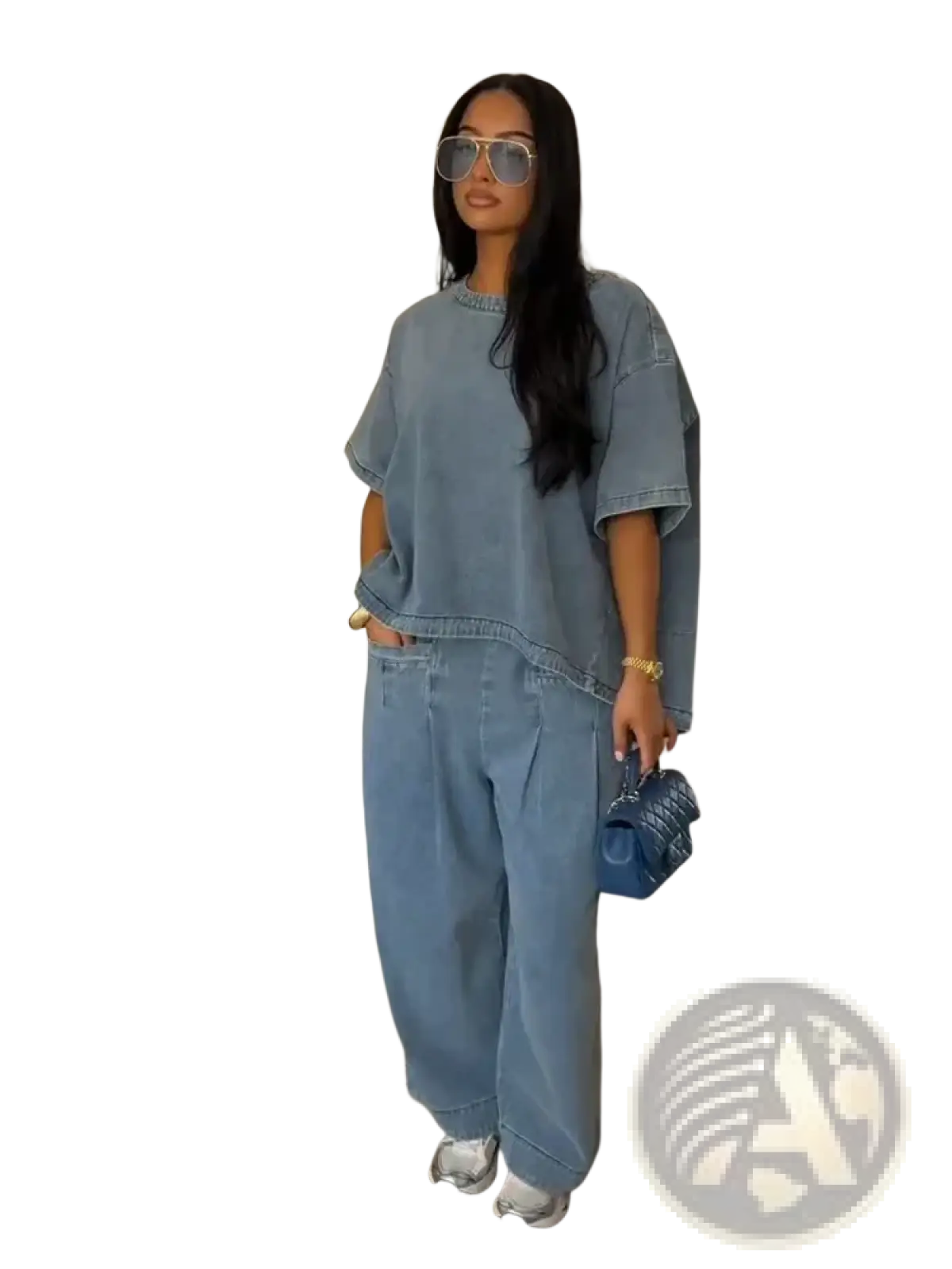 Blue denim oversized blouse with short sleeves and relaxed fit paired with wide leg pants in denim set