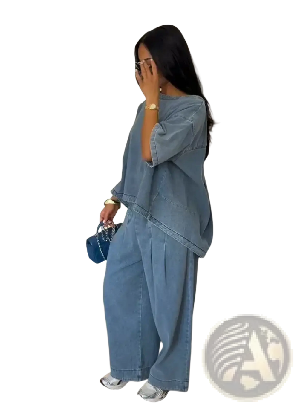 Blue denim two-piece outfit featuring wide-leg pants and an oversized blouse in a casual stylish design