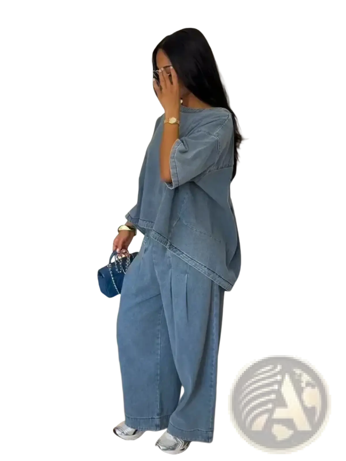 Blue denim two-piece outfit featuring wide-leg pants and an oversized blouse in a casual stylish design