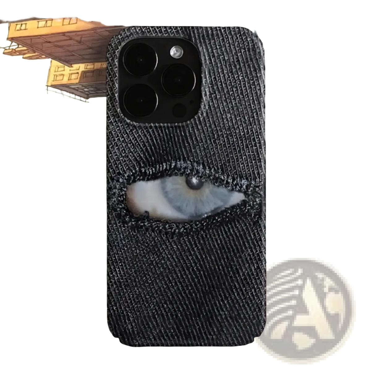 Dark denim-textured phone case with a realistic eye design peeking through a torn hole on the back side