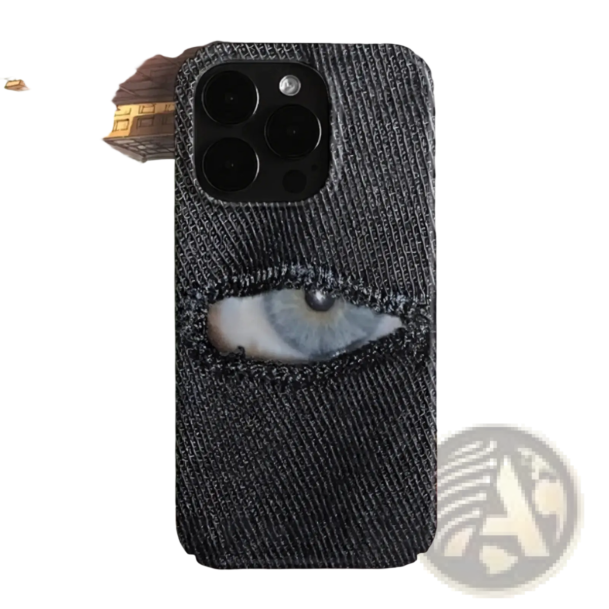 Denim textured phone case back side with a realistic blue eye peeking through a torn hole design
